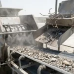 Concrete recycling process showing crushing, screening, and rebar removal for RCA production.