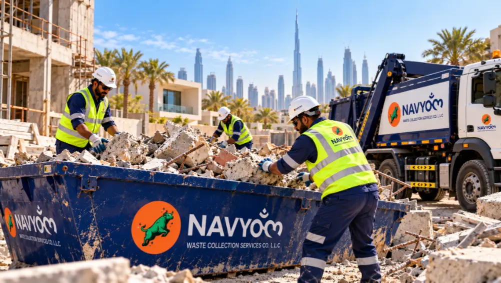Concrete & Rubble Removal Dubai | Cost, Skips & Disposal 3 Concrete waste loading in Dubai with rubble being transferred into a Navyom construction waste container